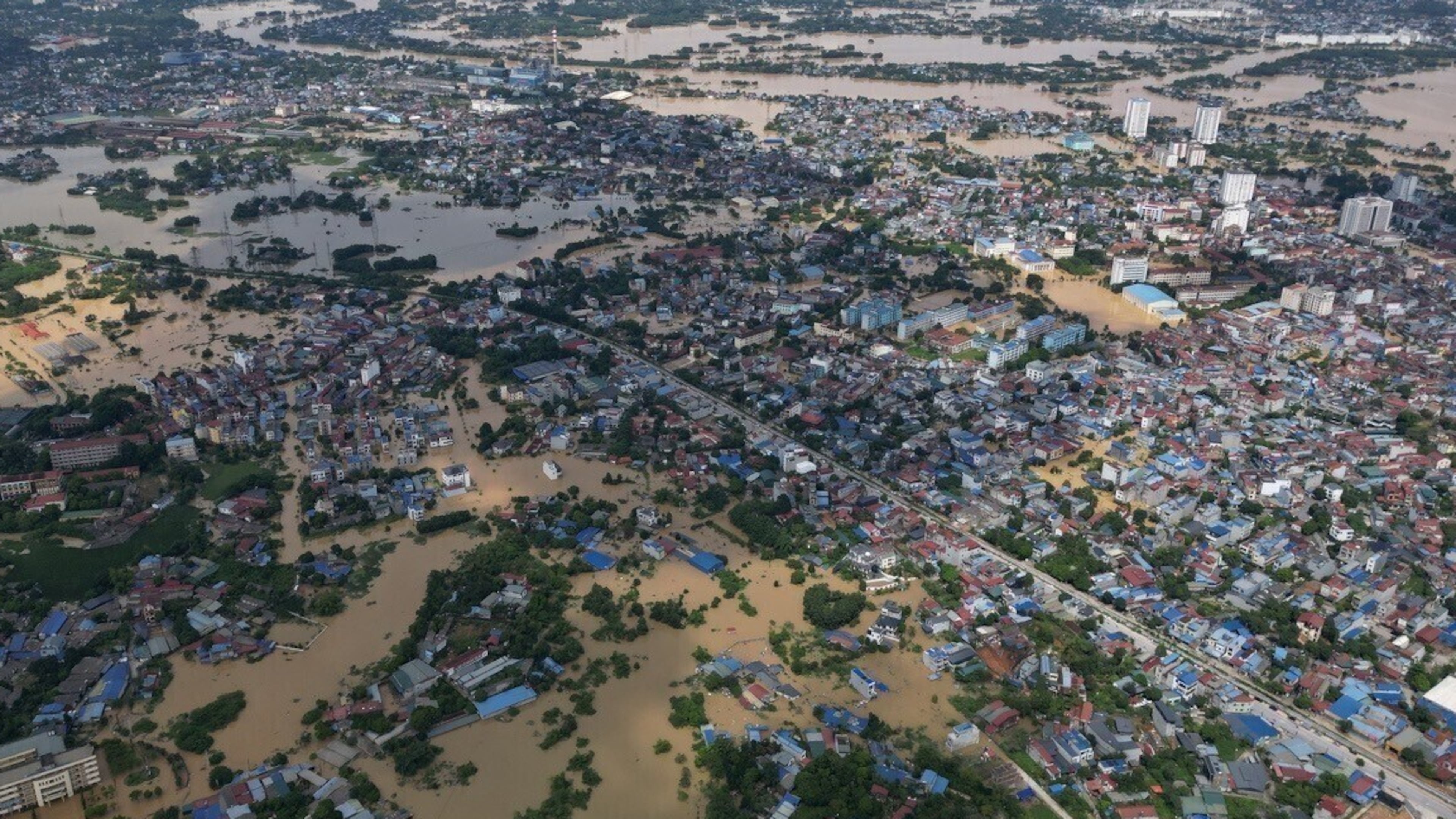 FILE- This aerial image shows flooding in the aftermath of typhoon Matmo in Thai Nguyen, Vietnam, Oct. 8, 2025. (Bui Cuong Quyet/VNA via AP, File)