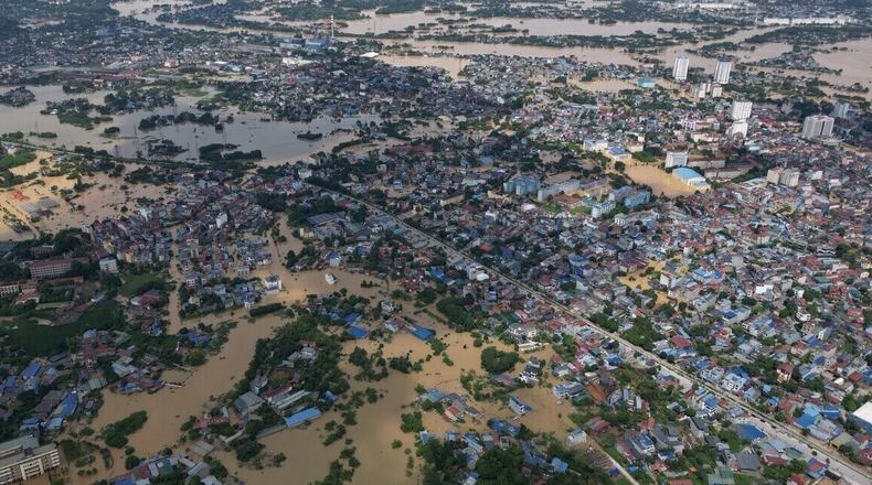 FILE- This aerial image shows flooding in the aftermath of typhoon Matmo in Thai Nguyen, Vietnam, Oct. 8, 2025. (Bui Cuong Quyet/VNA via AP, File)