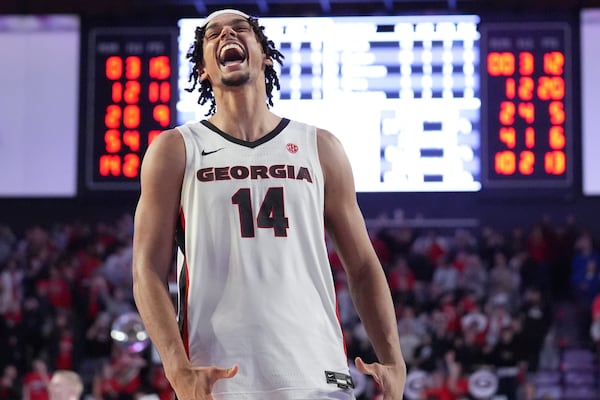 FILE - Georgia forward Asa Newell (14) reacts to a win against Kentucky after an NCAA college basketball game, Tuesday, Jan. 7, 2025, in Athens, Ga. (AP Photo/Brynn Anderson, File)