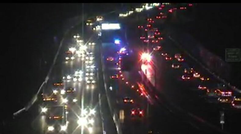 A right lane was blocked on the I-75 express lanes after a police pursuit through Newton and Henry counties Tuesday morning.