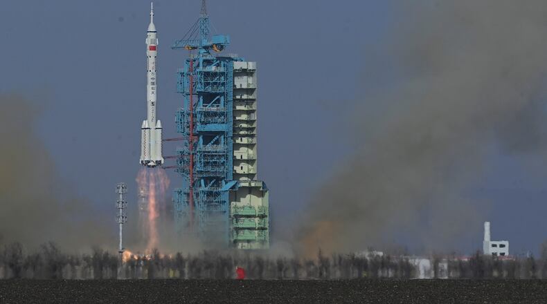 In this photo provided by China's Xinhua News Agency, the Shenzhou-22 spaceship is launched from the Jiuquan Satellite Launch Center in Jiuquan, northwestern China, Tuesday, Nov. 25, 2025. (Wang Jiangbo/Xinhua via AP)