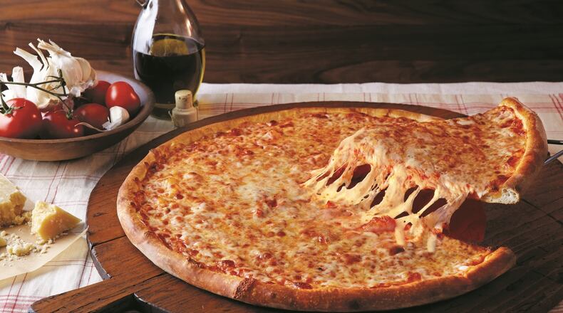 It's a pizza party! Download a coupon and enjoy a free Neapolitan slice today. Photo credit: Villa Italian Kitchen.