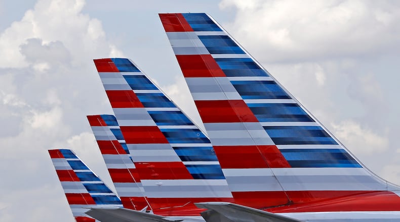 FILE - American Airlines passenger planes are parked at Miami International Airport, in Miami on July 17, 2015. (AP Photo/Alan Diaz, File)