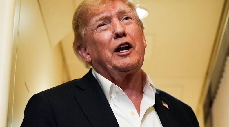 President Donald Trump speaks with reporters while in flight on Air Force One from Shannon, Ireland to Joint Base Andrews, Md., Sunday, Sept. 13, 2026. (AP Photo/Julia Demaree Nikhinson)
