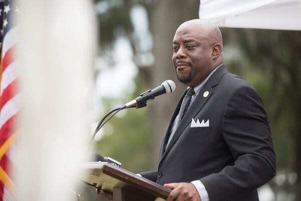 Savannah Mayor Van Johnson delivers remarks prior to the burial of 500 unclaimed cremated remains from the Chatham County Coroner's Office on Wednesday.