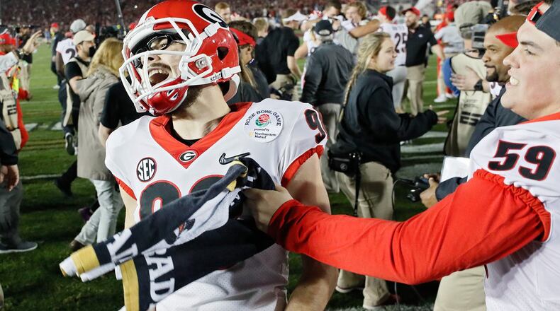Georgia Bulldogs place-kicker Rodrigo Blankenship (98) celebrates after Georgia won the College Football Playoff semifinal at the Rose Bowl on Monday, January 1, 2018, in Pasadena. BOB ANDRES /BANDRES@AJC.COM