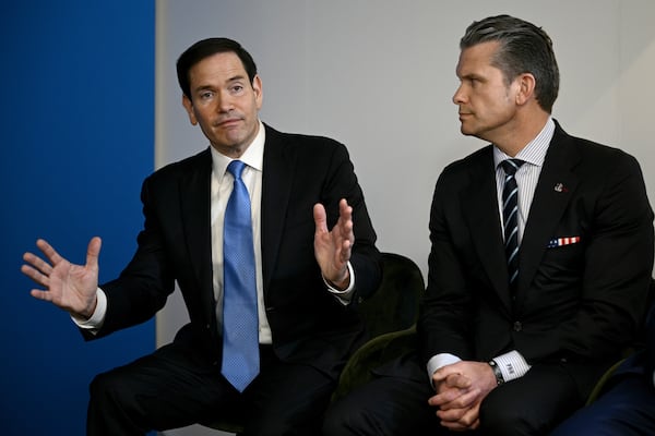 U.S. Secretary of State Marco Rubio, left, speaks next to U.S. Defense Secretary Pete Hegseth during a meeting between U.S. President Donald Trump with NATO Secretary General Mark Rutte at the NATO summit of heads of state and government in The Hague, Netherlands, Wednesday, June 25, 2025.(Brendan Smialowski/Pool Photo via AP)