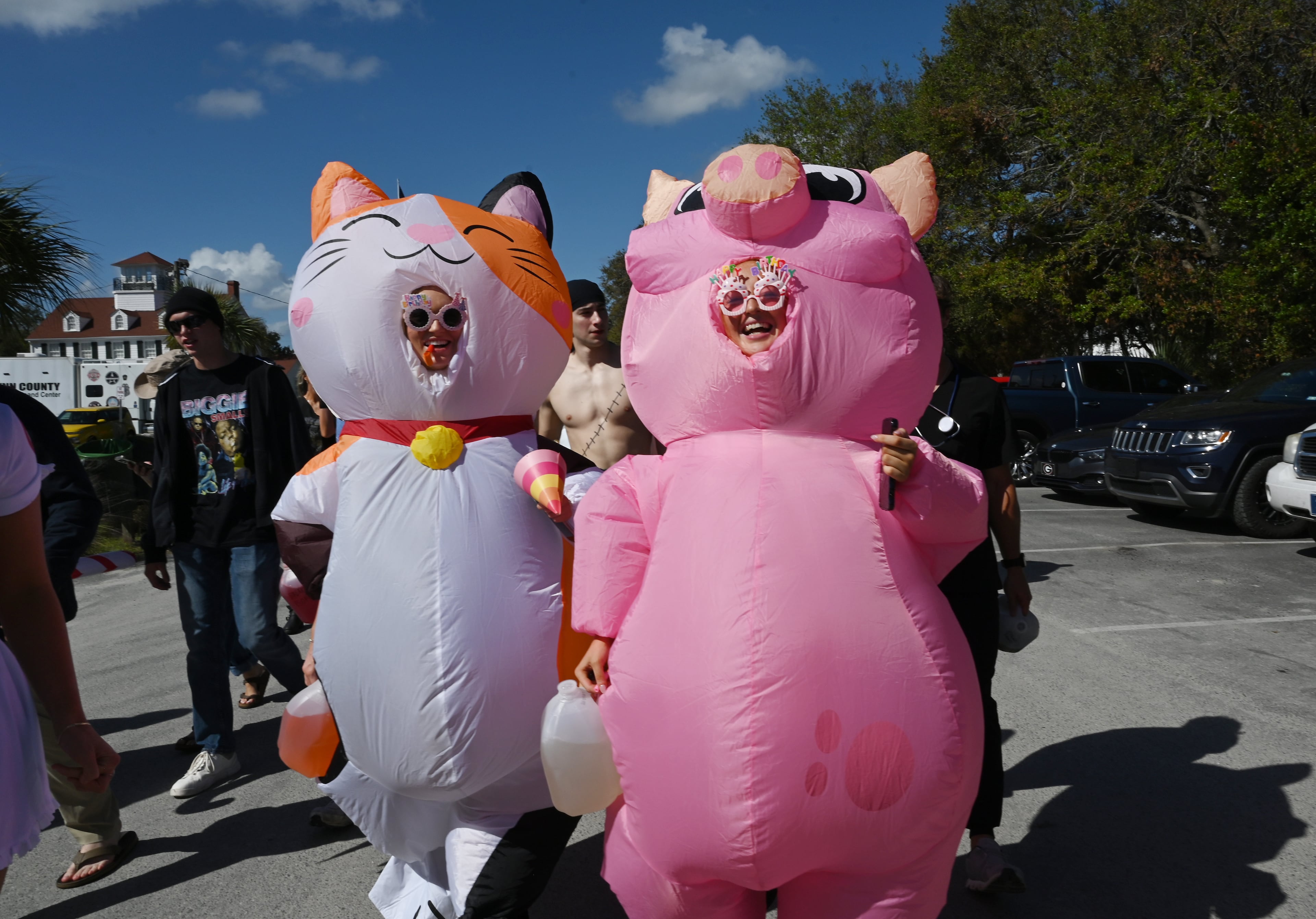 UGA students with Halloween costumes arrive for the annual “Frat Beach” party to celebrate before the annual Georgia-Florida football game on St. Simons Island, Friday, November 1, 2024. On the weekend of the Georgia-Florida football game, St. Simons Island’s East Beach becomes “Frat Beach,” an open-air party teeming with thousands of college students. (Hyosub Shin / AJC)