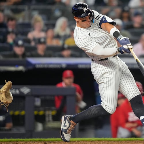 New York Yankees' Aaron Judge hits a home run during the sixth inning of a baseball game against the Los Angeles Angels, Monday, April 13, 2026, in New York. (AP Photo/Yuki Iwamura)