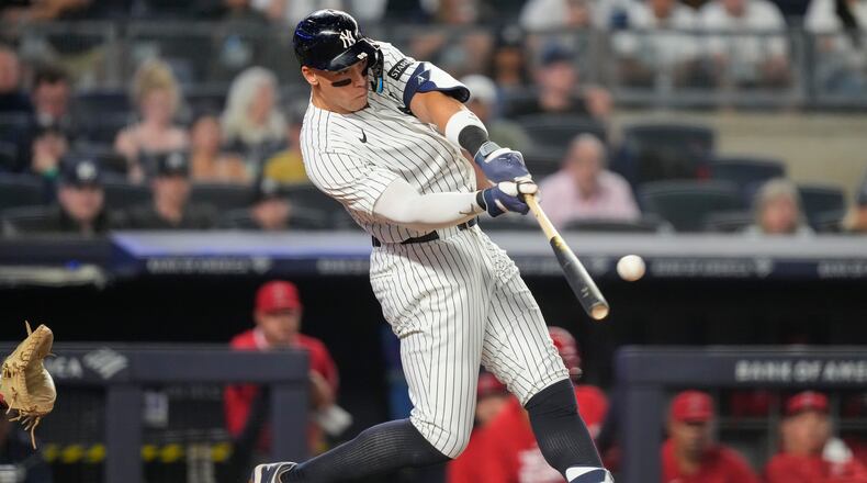 New York Yankees' Aaron Judge hits a home run during the sixth inning of a baseball game against the Los Angeles Angels, Monday, April 13, 2026, in New York. (AP Photo/Yuki Iwamura)