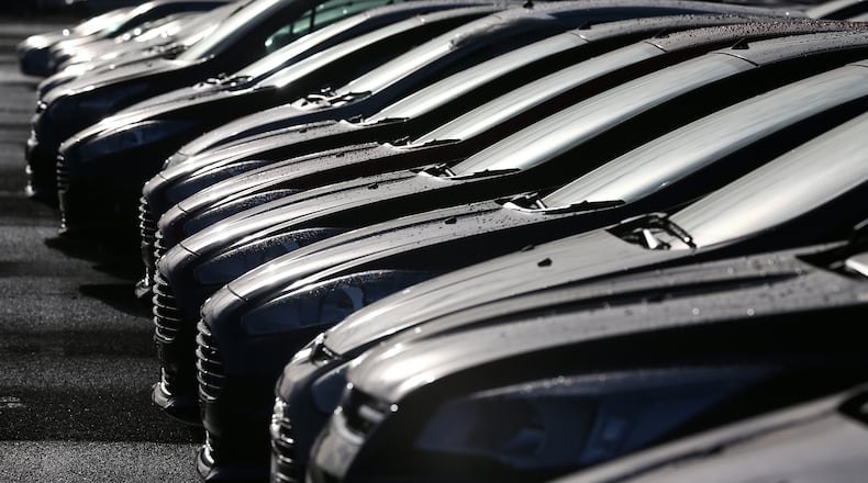 DAGENHAM, ENGLAND - JANUARY 13: Cars are prepared for distribution at a Ford factory on January 13, 2015 in Dagenham, England. Originally opened in 1931, the Ford factory has unveiled a state of the art GBP475 million production line that will start manufacturing the new low-emission, Ford diesel engines from this November this will generate more than 300 new jobs, Ford currently employs around 3000 at the plant in Dagenham. (Photo by Carl Court/Getty Images)