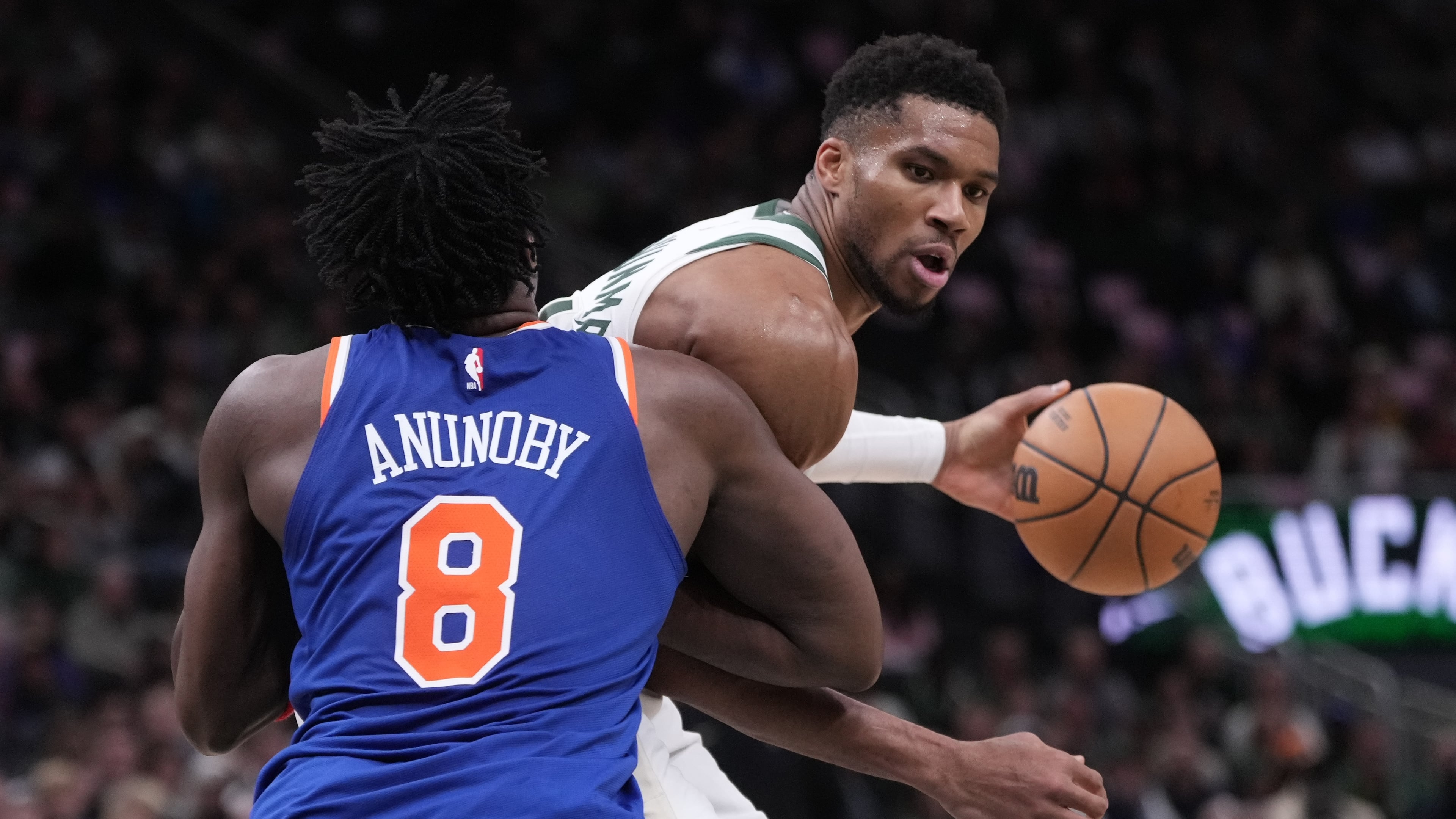 Milwaukee Bucks' Giannis Antetokounmpo tries to get past New York Knicks' OG Anunoby during the second half of an NBA basketball game Tuesday, Oct. 28, 2025, in Milwaukee. (AP Photo/Morry Gash)