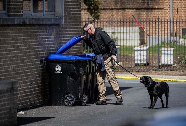 Police investigate Gov. Josh Shapiro's residence after someone set fire to the building on Sunday, April 13, 2025 in Harrisburg, Pa. (Sean Simmers/The Patriot-News via AP)
