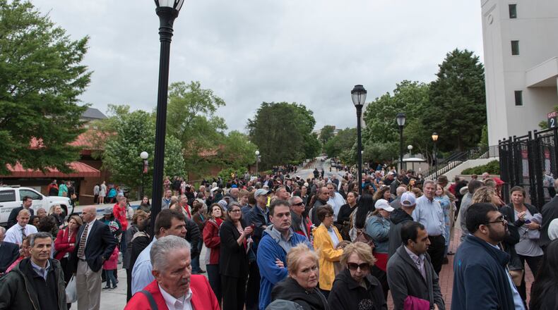 May 5, 2017, Athens - A crowd gathers by the entrance during the University of Georgia's undergraduate commencement ceremony at Sanford Stadium in Athens, Georgia, on Friday, May 5, 2017. (DAVID BARNES / DAVID.BARNES@AJC.COM)