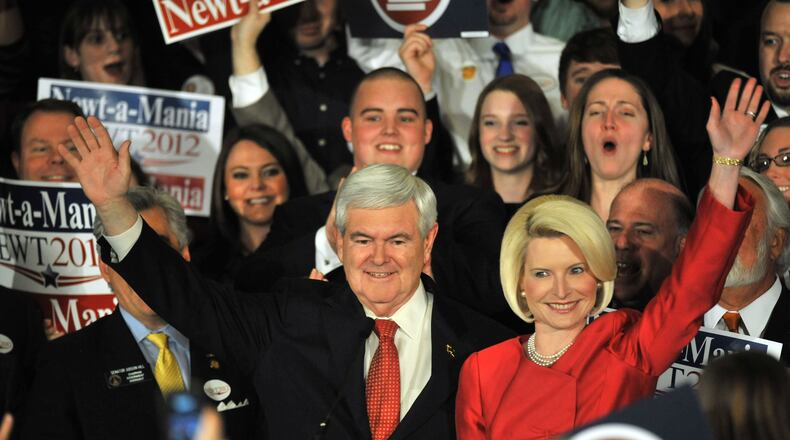 Newt Gingrich and his wife, Callista, greet supporters in Atlanta in 2012. Hyosub Shin, hshin@ajc.com