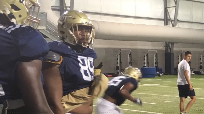Georgia Tech players, including defensive lineman Antwan Owens, wore new gold facemasks on their helmets at Tuesday's practice, September 24, 2019, in advance of their game at Temple on Saturday. (AJC photo by Ken Sugiura)