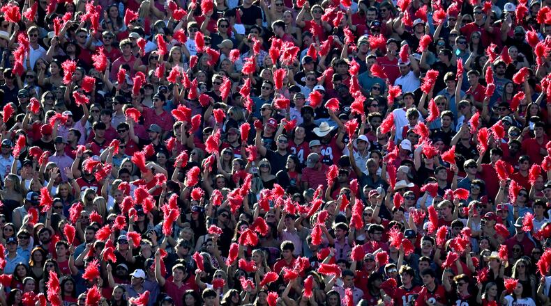 Georgia fans cheer during the first half in an NCAA football game at Sanford Stadium, Saturday, September 2, 2023, in Athens. Georgia won 48-7 over UT Martin. (Hyosub Shin / Hyosub.Shin@ajc.com)