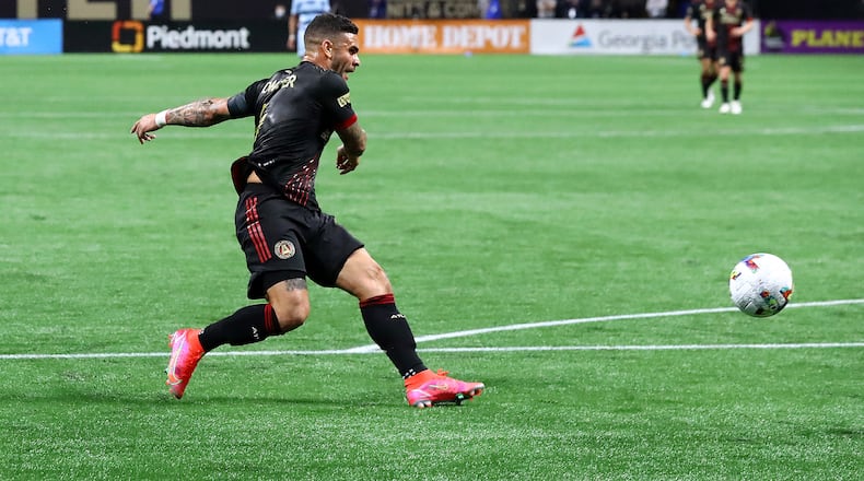 Atlanta United's Dom Dwyer scores a goal for a 2-0 lead over Sporting KC on Sunday in Atlanta. If Luiz Araujo isn’t available for Atlanta United for Saturday’s game at Colorado, Dwyer showed manager Gonzalo Pineda that he is among the candidates who can fill in at right wing. (Curtis Compton / Curtis.Compton@ajc.com)