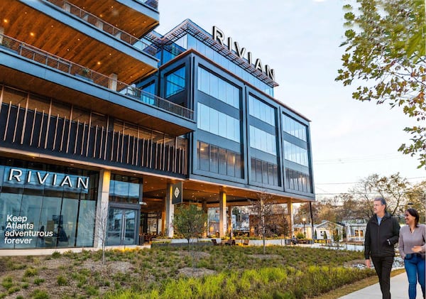Rivian announced it will establish an East Coast headquarters at Junction Krog District in Atlanta. The photo shows the building with a rendering of Rivian's logos on the facade. (Courtesy of Rivian)
