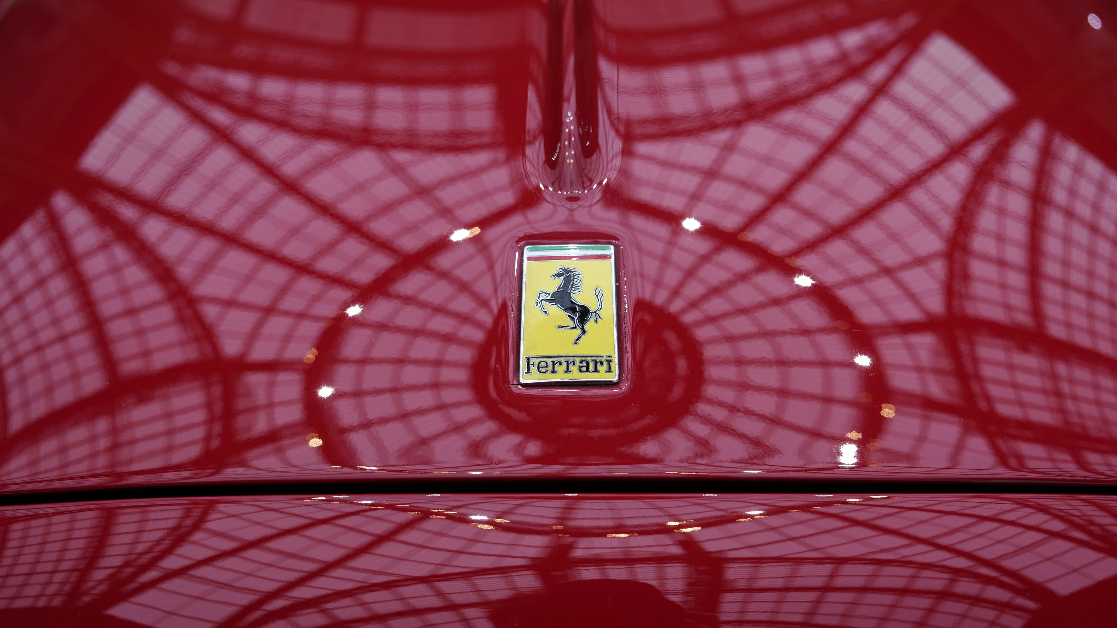 FILE - The Ferrari logo is photographed on a 1950 Oldsmobile Ferrari 166 MM Touring Barchetta displayed at the Grand Palais in Paris, Tuesday, Feb. 4, 2025. (AP Photo/Aurelien Morissard, File)