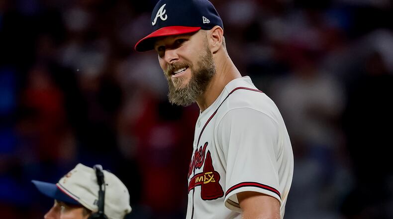 Atlanta Braves pitcher Chris Sale, right, celebrates after winning a baseball game shutout against the Los Angeles Dodgers, Thursday, Aug. 27, 2026, in Atlanta. (AP Photo/Erik S. Lesser)