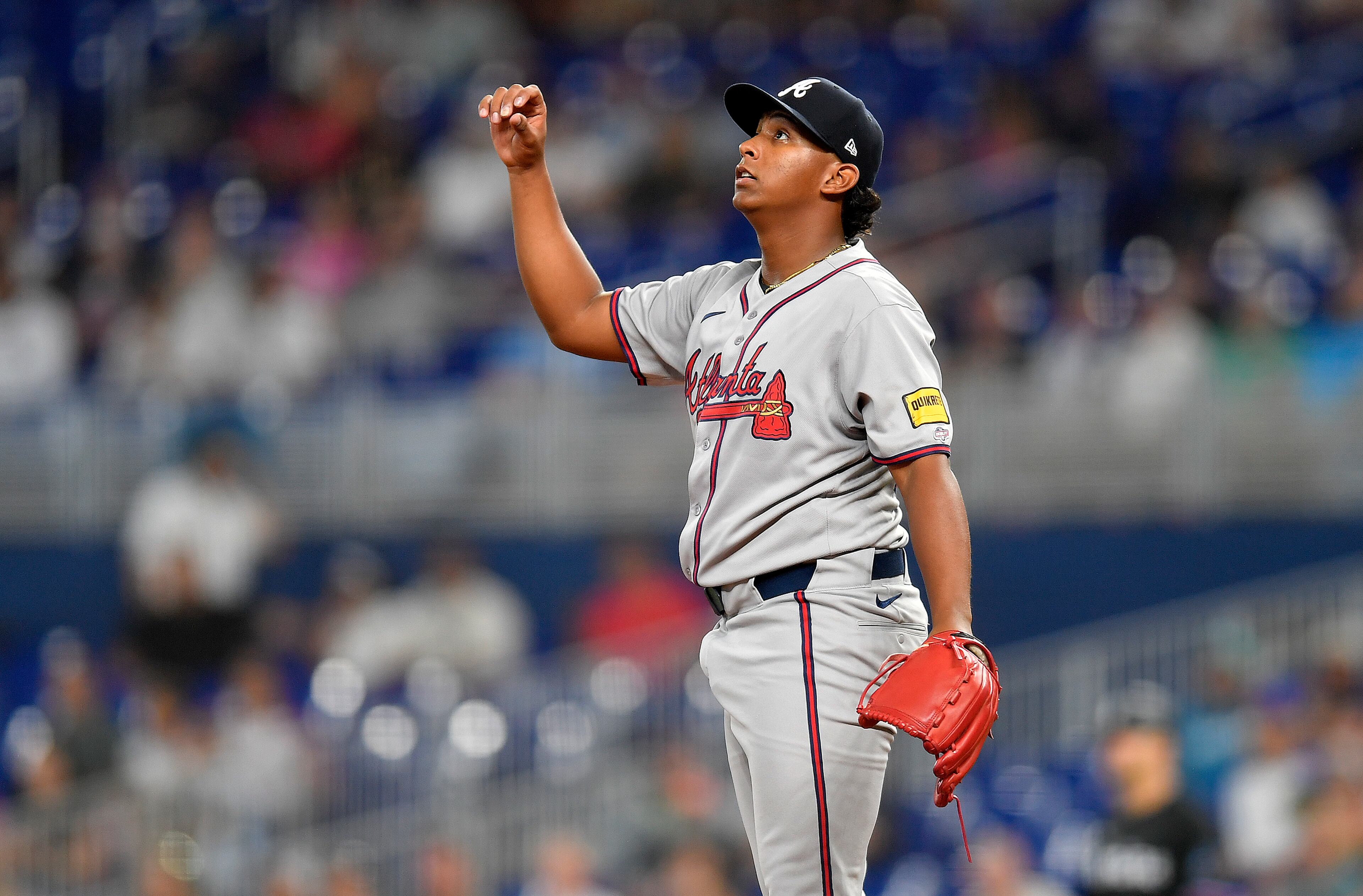 Braves pitcher Didier Fuentes watches a fly ball during his debut in Miami.