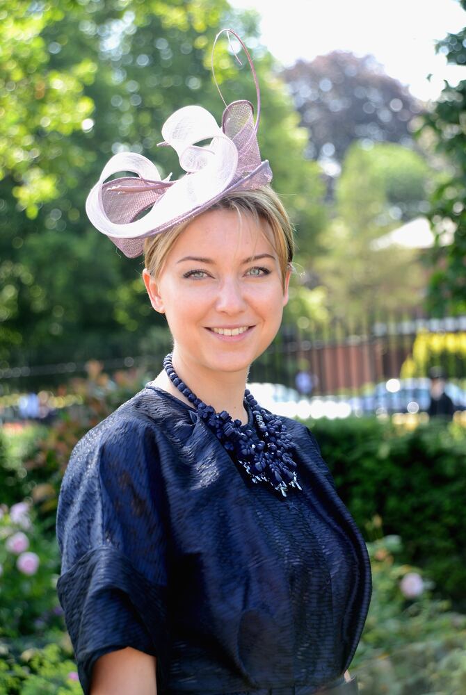 Race goers show hat styles