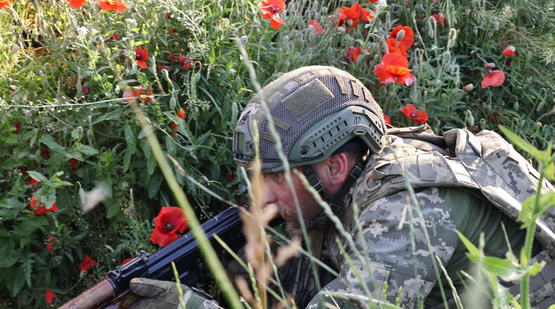 In this photo provided by Ukraine's 65th Mechanized Brigade press service, a soldier practices military skills at a training ground near the frontline in the Zaporizhzhia region, Ukraine, Thursday, June 11, 2026. (Andriy Andriyenko/Ukraine's 65th Mechanized Brigade via AP)