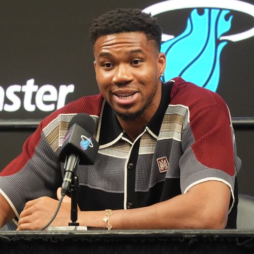 Giannis Antetokounmpo speaks during a news conference where he was introduced as a new member of the Miami Heat team Thursday, July 16, 2026, in Miami. (AP Photo/Marta Lavandier)