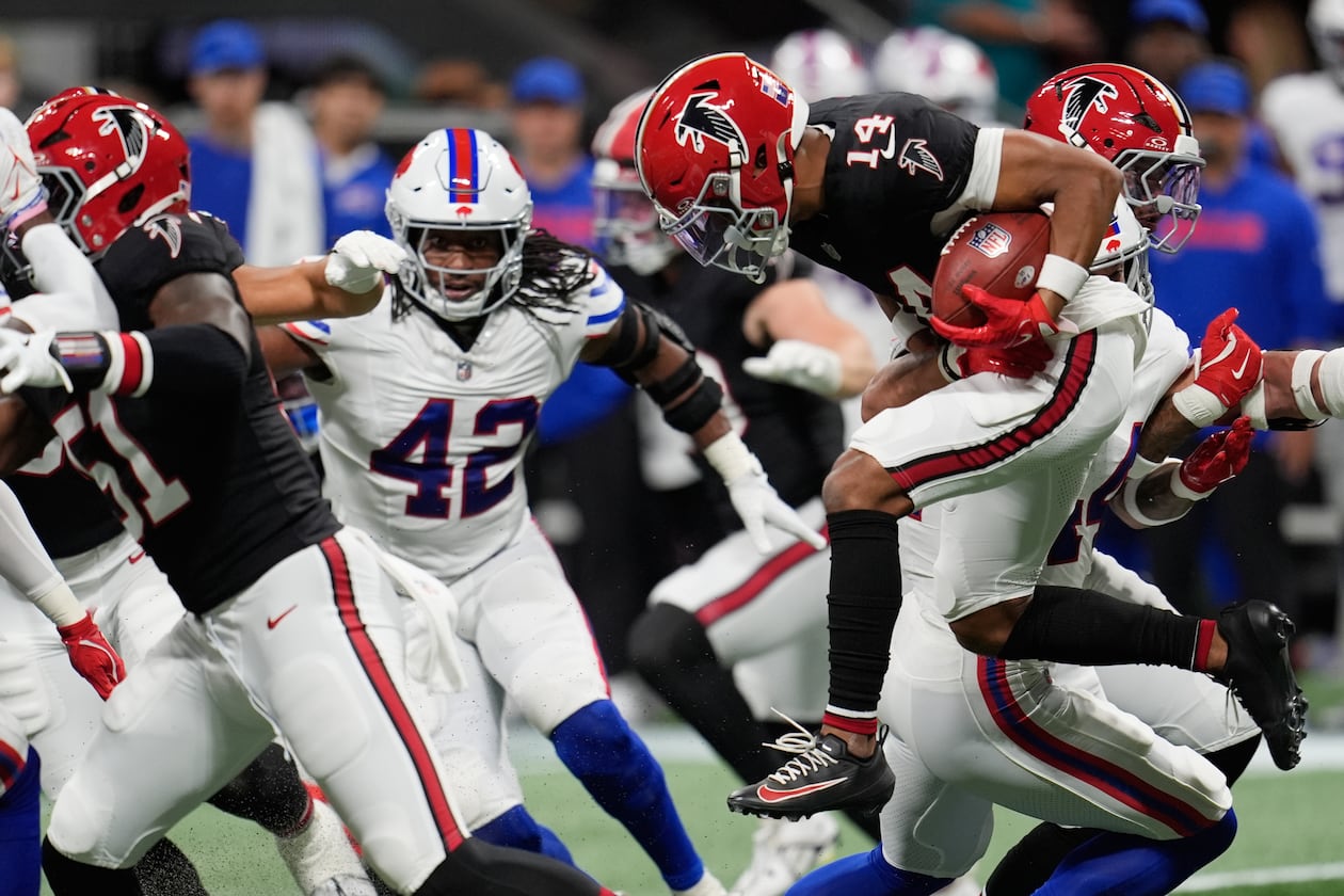 Atlanta Falcons wide receiver Jamal Agnew (14) leaps for yardage during the first half of an NFL football game against the Buffalo Bills, Monday, Oct. 13, 2025, in Atlanta. (Mike Stewart/AP)