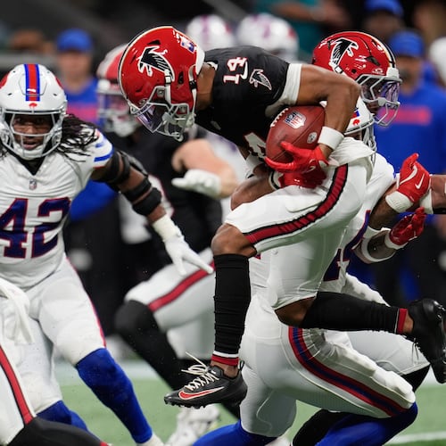 Atlanta Falcons wide receiver Jamal Agnew (14) leaps for yardage during the first half of an NFL football game against the Buffalo Bills, Monday, Oct. 13, 2025, in Atlanta. (Mike Stewart/AP)
