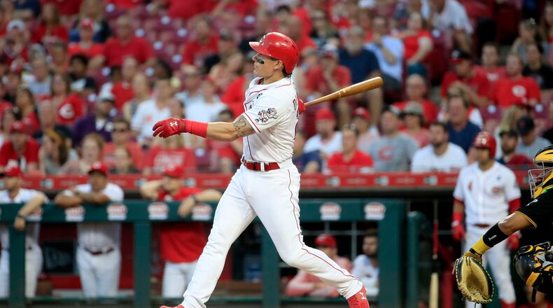 Derek Dietrich of the Cincinnati Reds  hits a home run in the 7th inning. (Photo by Andy Lyons/Getty Images)