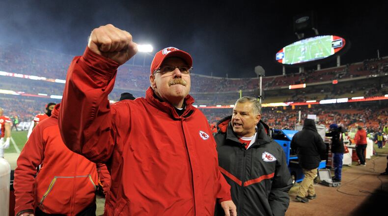Kansas City Chiefs head coach Andy Reid pumps his fist to fans following an NFL football game against the Oakland Raiders in Kansas City, Mo., Sunday, Jan. 3, 2016. The Kansas City Chiefs won 23-17. (AP Photo/Ed Zurga)