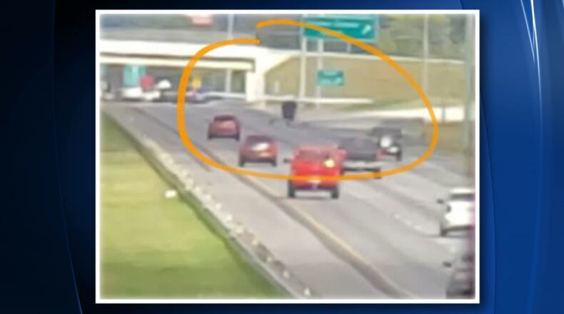 A small passenger place made an emergency landing on I-75 in Gordon County on Sunday afternoon.  The area circled on the image indicates the plane on the roadway. (Photo provided by Channel 2 Action News)