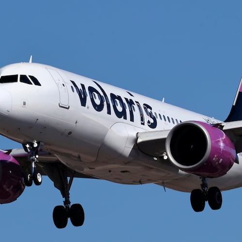An Airbus A320 jetliner, belonging to low-cost Mexican carrier Volaris, lands at Harry Reid International Airport in Las Vegas in 2024. The discount airline announced it will launch service to Atlanta starting next month, adding to the competition on flights to Mexico. (Larry MacDougal/AP)