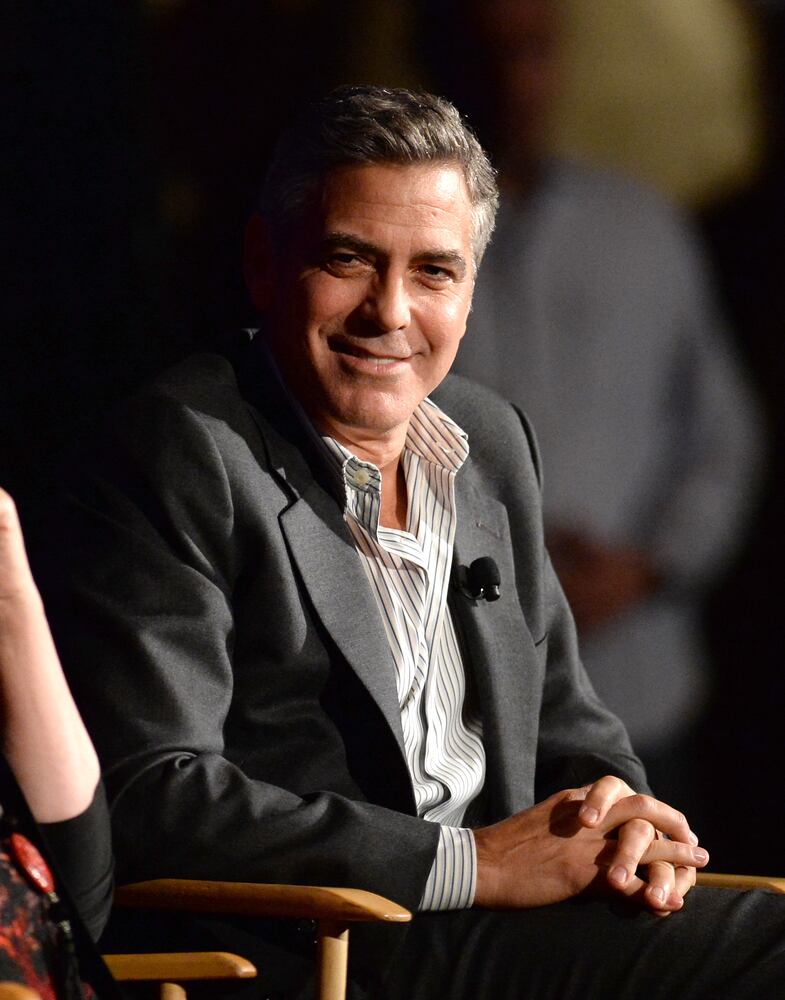 George Clooney worked in tobacco fields as a kid . . . and also tried out for the Cincinnati Reds in 1977. Obviously, he didn't make the team.