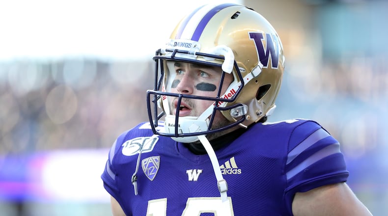 Jacob Eason of the Washington Huskies reacts in the first quarter against the Washington State Cougars during their game at Husky Stadium on November 29, 2019 in Seattle, Washington. (Photo by Abbie Parr/Getty Images)