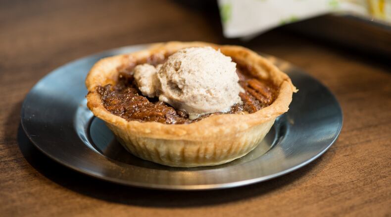 Fox Bros. Chocolate Pecan Pie with chocolate ganache pecan filling and homemade cinnamon whipped cream. Photo credit- Mia Yakel.