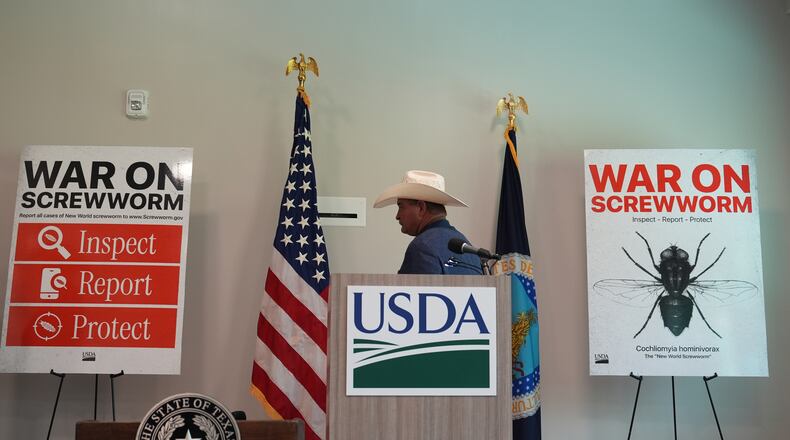 A ranchers arrivse for a news conference with U.S. Agriculture Secretary Brooke Rollins at the Knipling-Bushland U.S. Livestock Insects Research Laboratory in Kerrville, Texas, Monday, June 8, 2026. (AP Photo/Eric Gay)