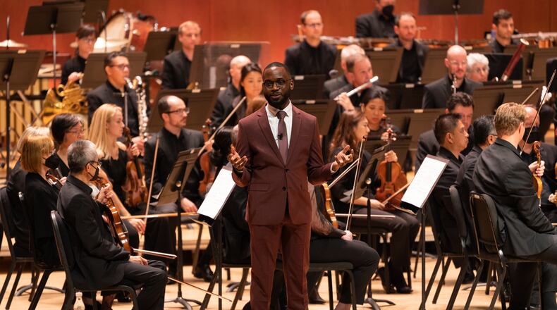 Composer Joel Thompson narrates "To Awaken the Sleeper" during the opening night of the Atlanta Symphony Orchestra's 2022-2023 season.