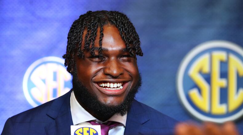071922 Atlanta: Alabama Crimson Tide linebacker Will Anderson Jr. breaks into laughter over a question at SEC Media Days in the College Football Hall of Fame on Tuesday, July 19, 2022, in Atlanta. “Curtis Compton / Curtis Compton@ajc.com”