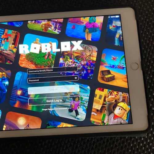 FILE - The gaming platform Roblox is displayed on a tablet, Oct. 30, 2021, in New York. (AP Photo/Leon Keith, File)