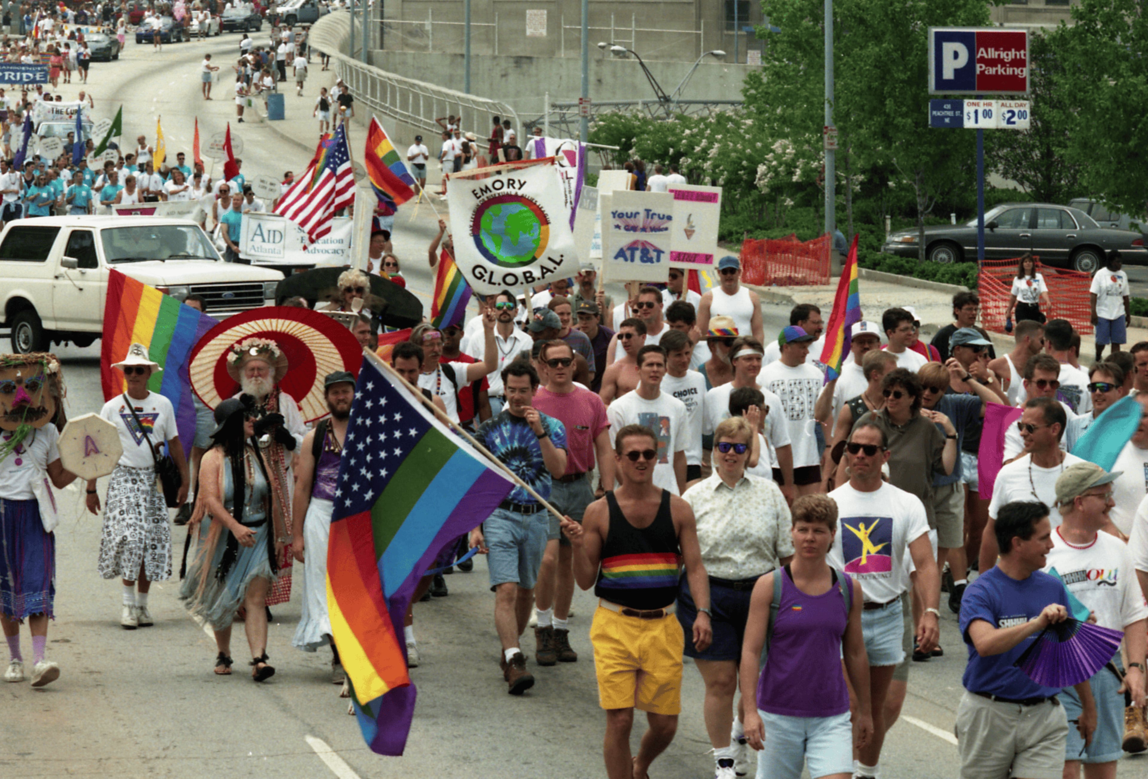 Members from the Emory University group G.L.O.B.A.L. and other participants of the 25th annual Gay Pride Parade marching north on Peachtree Street, Atlanta, Georgia, June 25, 1995. (Atlanta Journal-Constitution Photographic Archives. Special Collections and Archives, Georgia State University Library.)