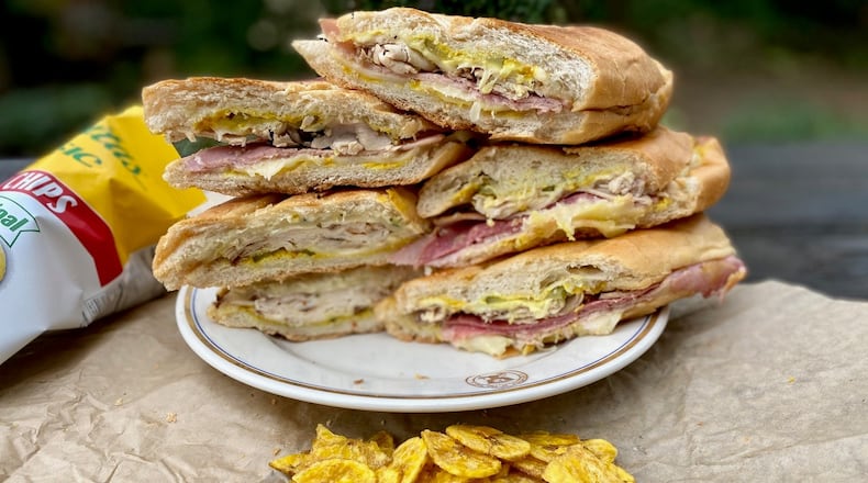 Cubanos ATL focuses mainly on Cuban sandwiches. Shown here are El Miami (classic); El Tampa (with salami) and El Pollo (made with jerk-spice-rubbed deli chicken); they are $11.99 each.
Wendell Brock for The Atlanta Journal-Constitution