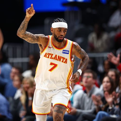 Atlanta Hawks guard Nickeil Alexander-Walker got a key defensive stop down the stretch to secure a 113-110 win over the Hornets on Sunday night. (Colin Hubbard/AP)