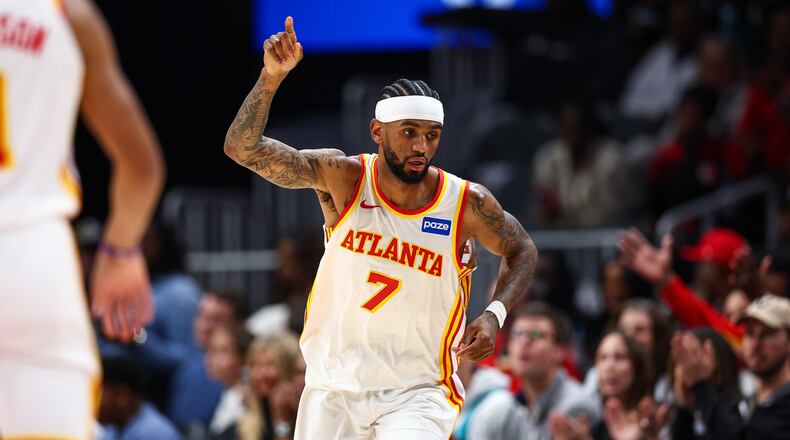 Atlanta Hawks guard Nickeil Alexander-Walker got a key defensive stop down the stretch to secure a 113-110 win over the Hornets on Sunday night. (Colin Hubbard/AP)