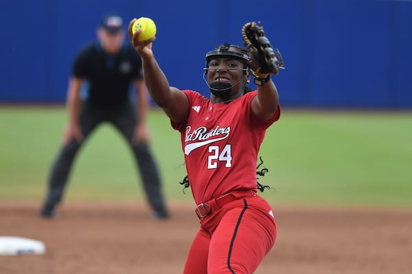 Texas pitcher NiJaree Canady throws during the third game of the NCAA softball Women's College World Series finals against Texas in Oklahoma City, Friday, June 6, 2025. (AP Photo/Kyle Phillips)