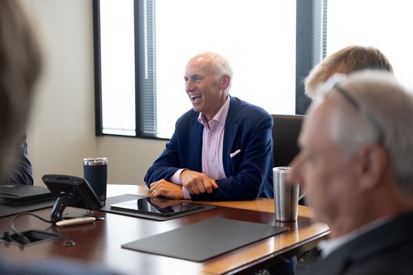 Eric Tanenblatt, Dentons’ global chair of public policy and regulation, leads a meeting at the law firm’s office in Atlanta on July 29, 2026. (Arvin Temkar/AJC)