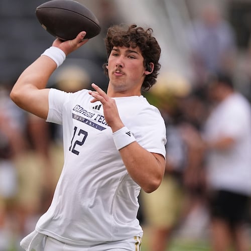 FILE - Georgia Tech quarterback Aaron Philo warms up before an NCAA college football game against Colorado, Friday, Aug. 29, 2025, in Boulder, Colo. (AP Photo/David Zalubowski, File)