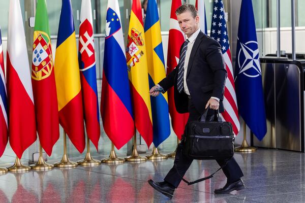 Sweden's Defense Minister Pal Jonson arrives for a meeting of the Ukraine Defence Contact Group at NATO headquarters in Brussels, Friday, April 11, 2025. (AP Photo/Geert Vanden Wijngaert)